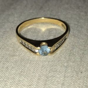 14 karat gold ring w/ aquamarine stone & diamonds